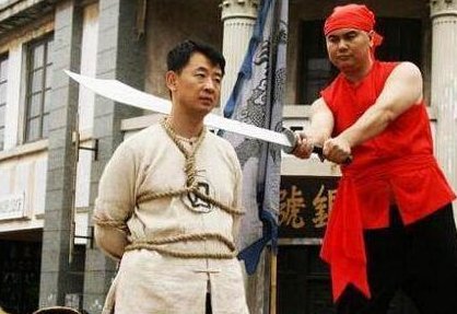 “侩子手”的“侩”读什么？